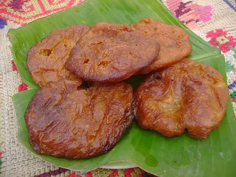 Arisa Pitha, a sweet meal made from rice, which is eaten as a delicacy on Nuaikhai. Photo by Creative Commons