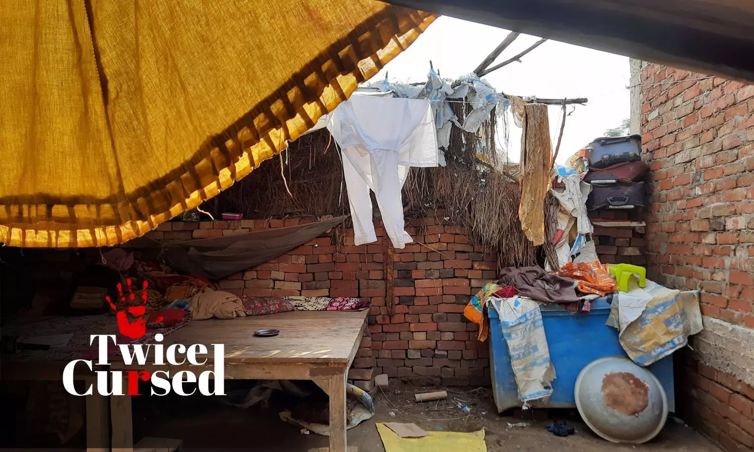 The rape survivors house that does not have a single room or a toilet. All belongings including documents, books, vegetables, are kept in open. Photo: Shivani Gupta 