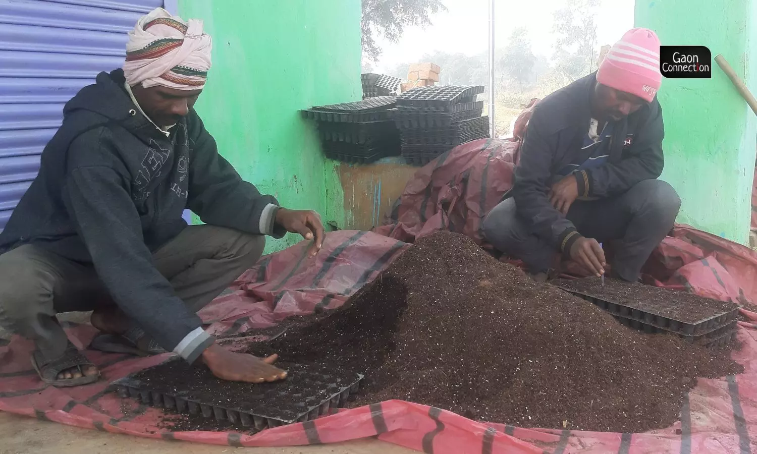 Nand Kishor Murmu making herbal pesticide for nursery in Hesapoda village.