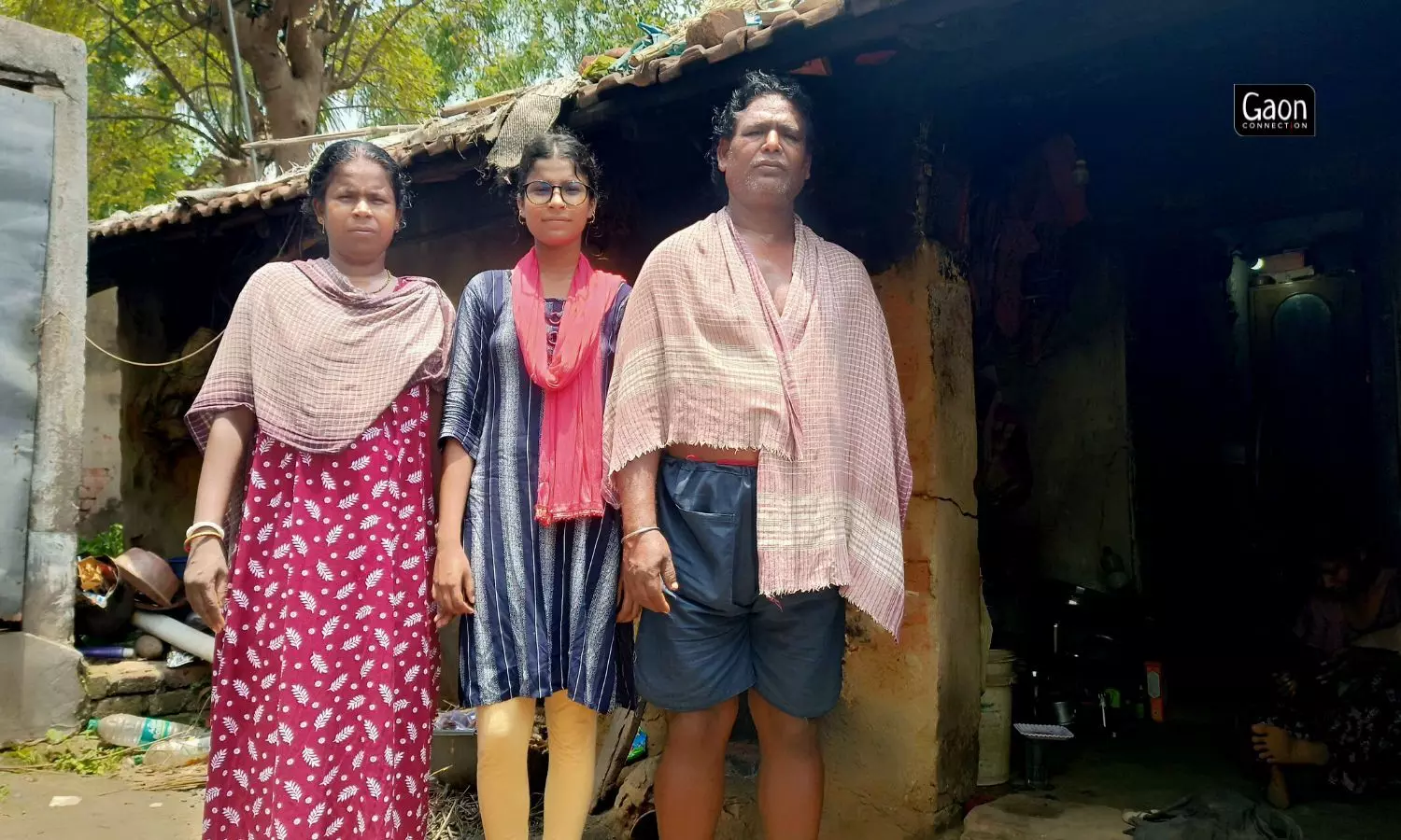 Shraboni Shit with her parents. The joint first rank holder comes from straitened circumstances.