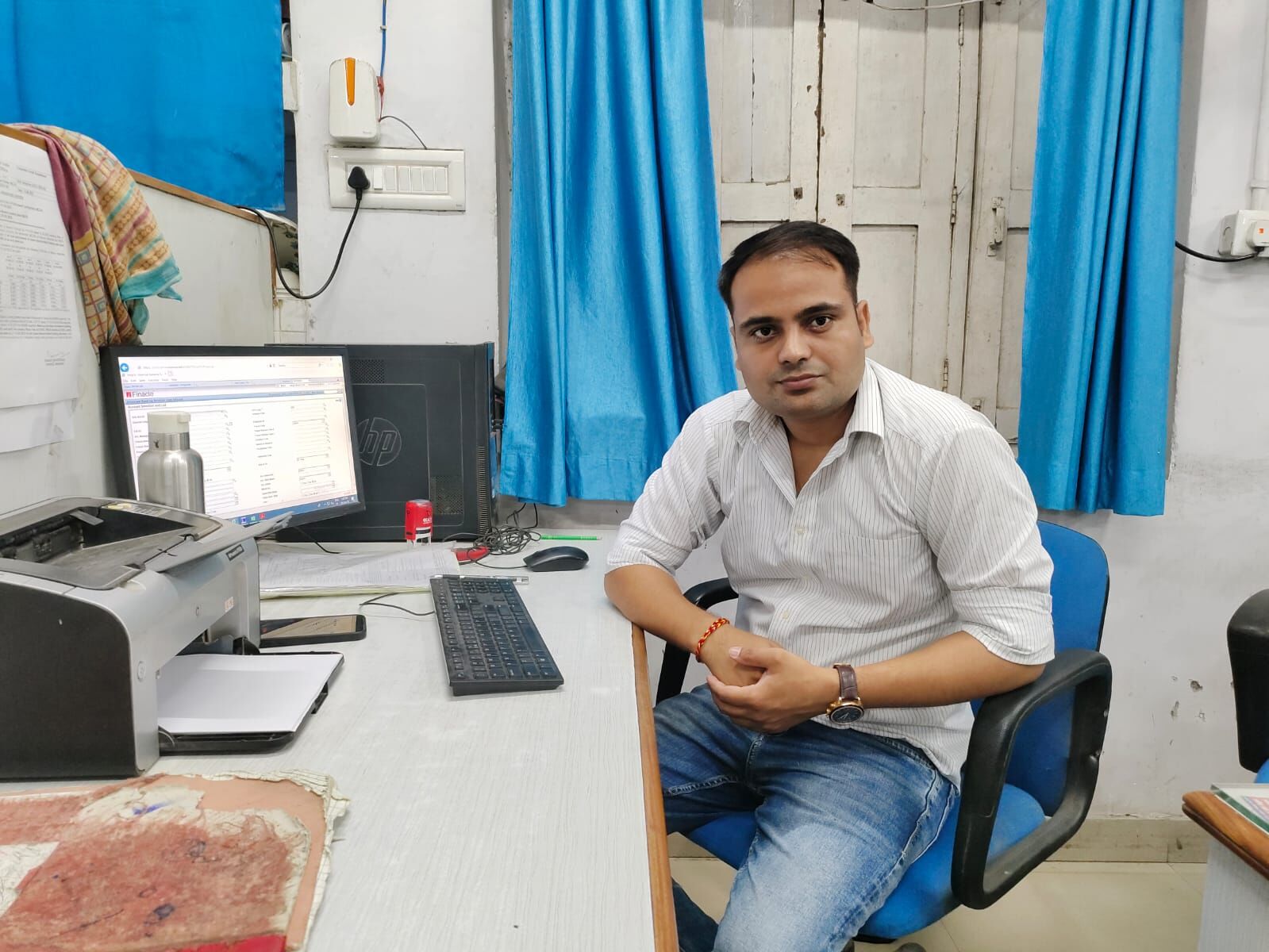 Pawan Shukla, an assistant manager at the Bank of India in Tikaitganj.