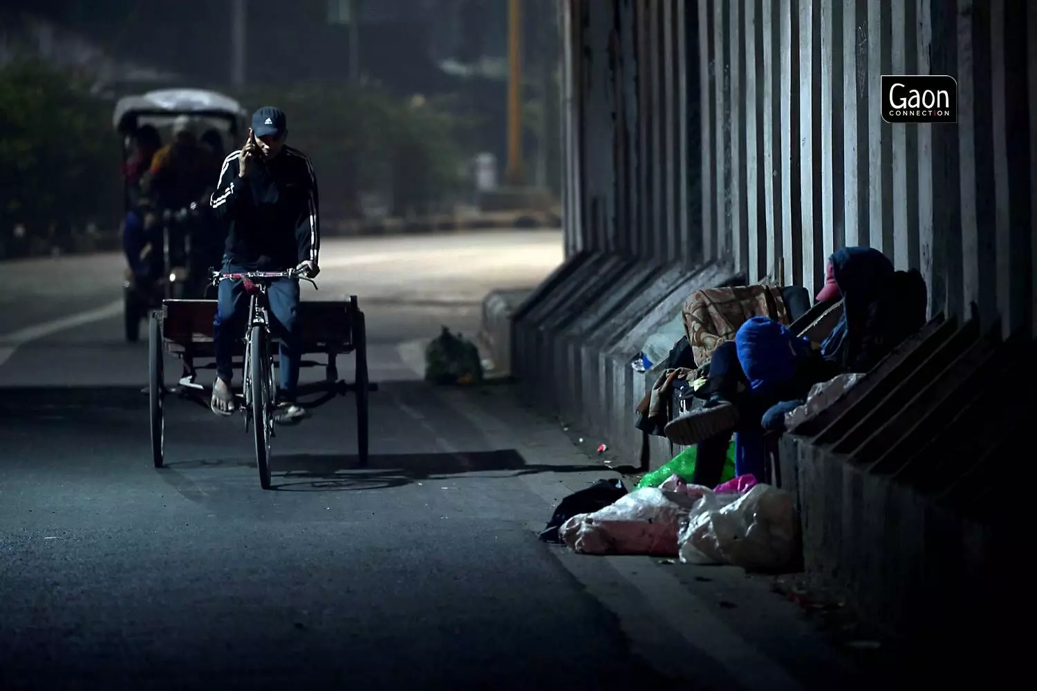 A man is seen sleeping under a bridge in Old Delhi